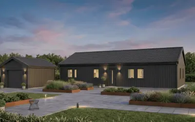 Modernt mörkt enfamiljshus med garage. Vacker trädgård med rabatter. En bra start för att planera bygga villa kostnad.